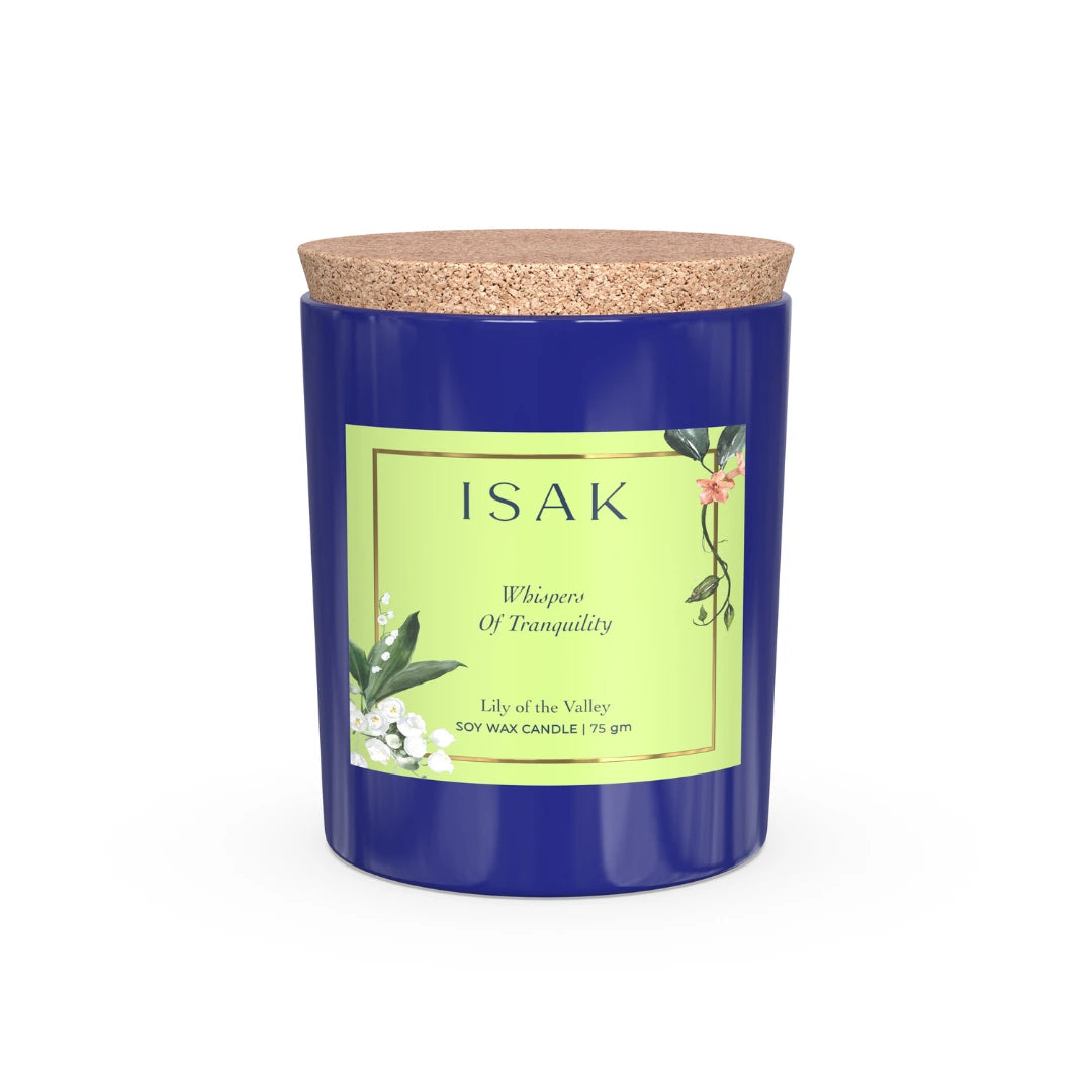 Blue glass scented candle with white wax and green label, 75 gm.