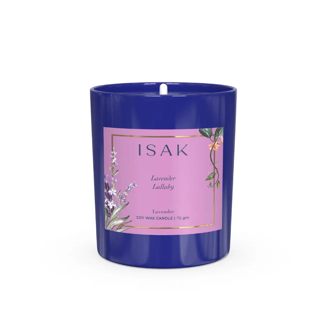 Blue glass jar scented candle with lavender label, unlit and centered wick.