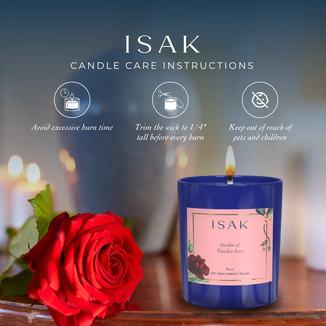 Blue jar scented candle with burning wick and rose design label