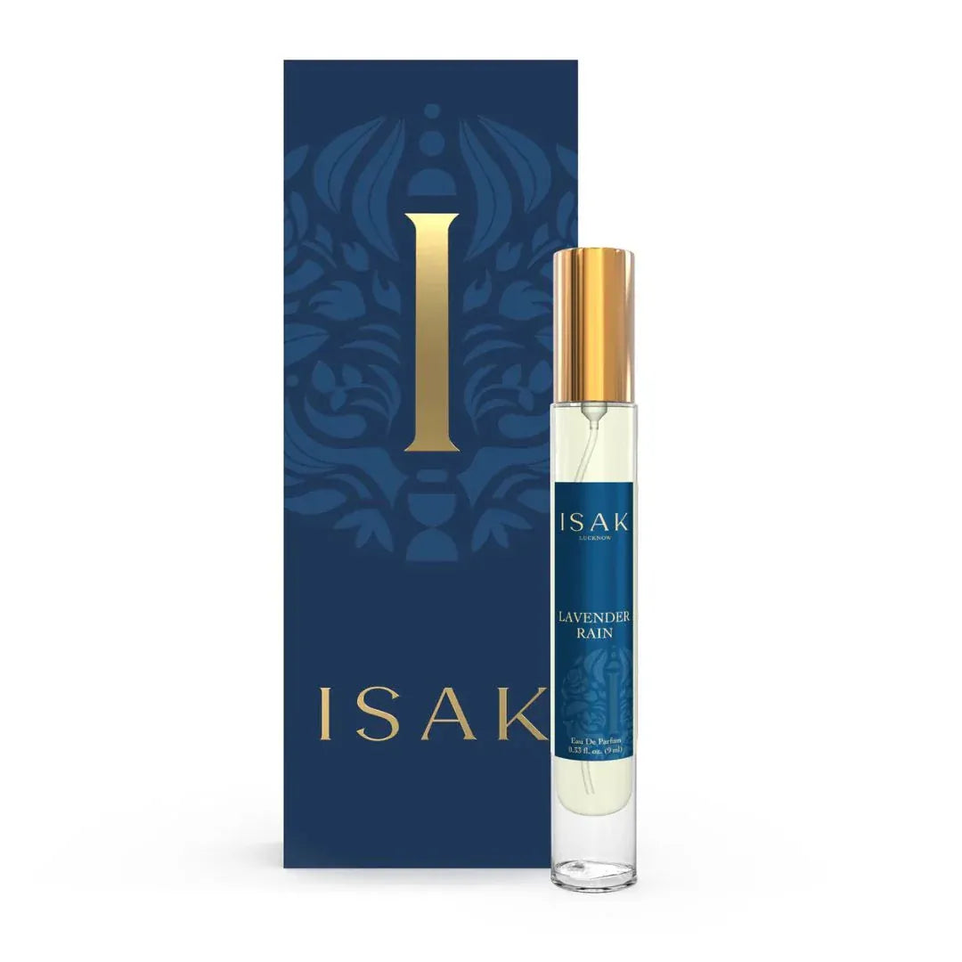 Lavender Rain perfume mini bottle beside navy gift box with gold 'I' logo