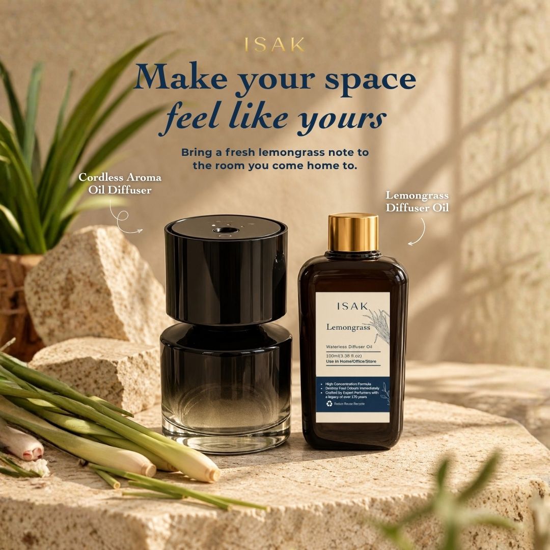 Cordless aroma diffuser with lemongrass oil, black top and gold-capped bottle