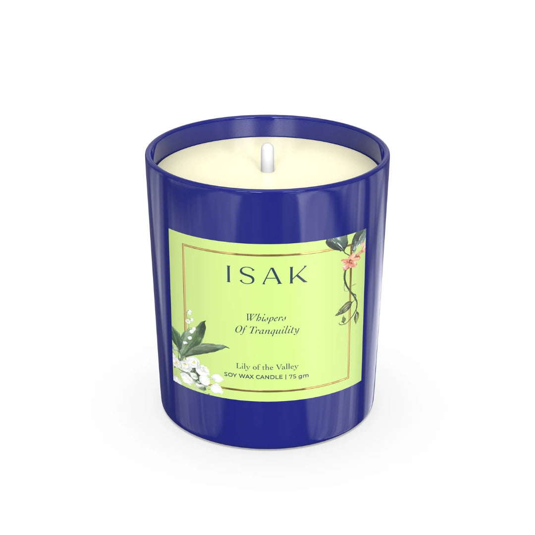 Blue glass scented candle with white wax and printed green label, 75 gm.