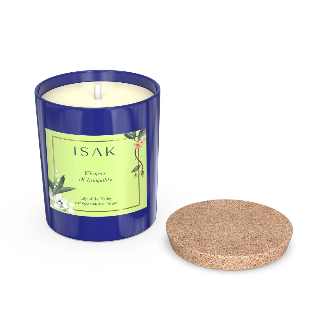 Blue glass scented candle with cork lid, white wax, green label, 75 gm.