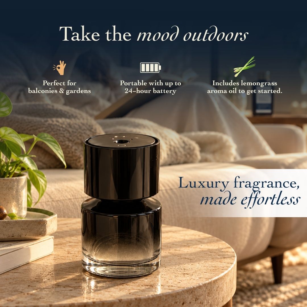 Cordless aroma diffuser with lemongrass oil, black glossy top and clear glass base