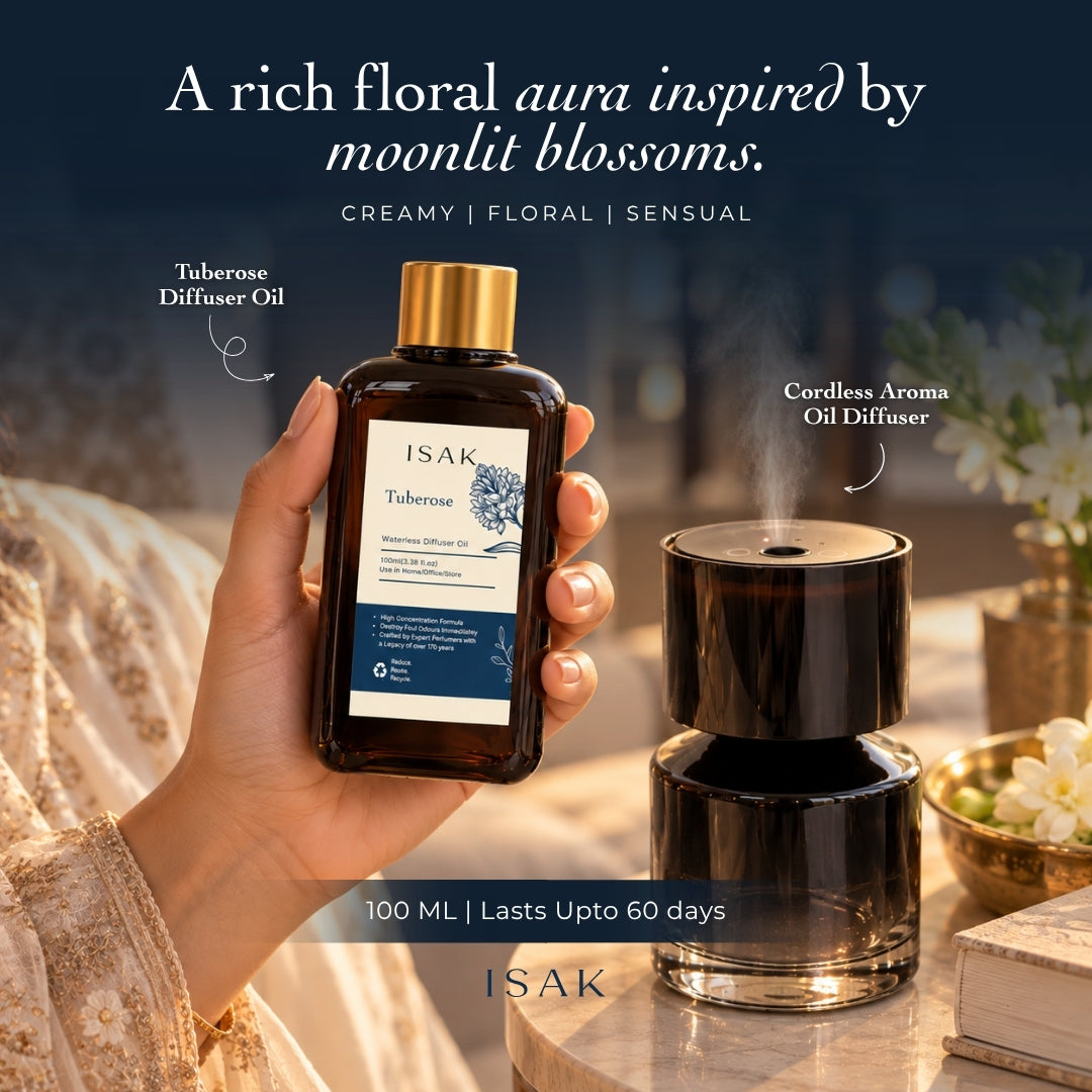 Cordless aroma diffuser and tuberose fragrance oil bottle with gold cap