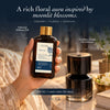 Cordless aroma diffuser and tuberose fragrance oil bottle with gold cap