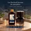 Cordless aroma diffuser and patchouli fragrance oil set on a table, glossy dark finish