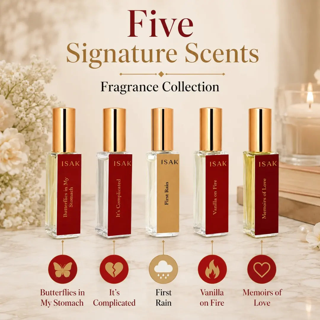 Five mini ISAK perfume bottles with gold caps, red and clear liquids