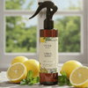 Citrus Burst air freshener spray bottle with amber liquid, black nozzle, lemon label