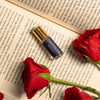 ISAK Rain Kissed Roses Attar mini 3 ml bottle with red roses