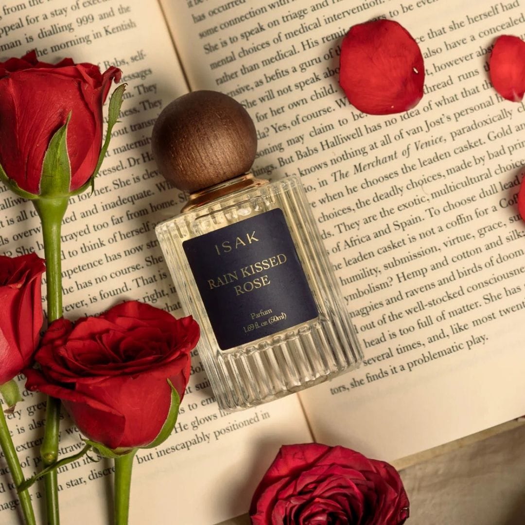 Rain Kissed Roses parfum 50ml bottle with wooden cap, dark-blue label